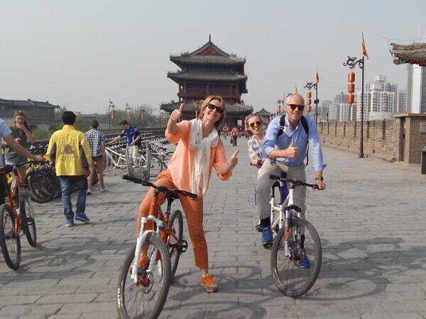 Listen to the Echoes of History while Cycling or Walking on the ancient Xi'an City Wall