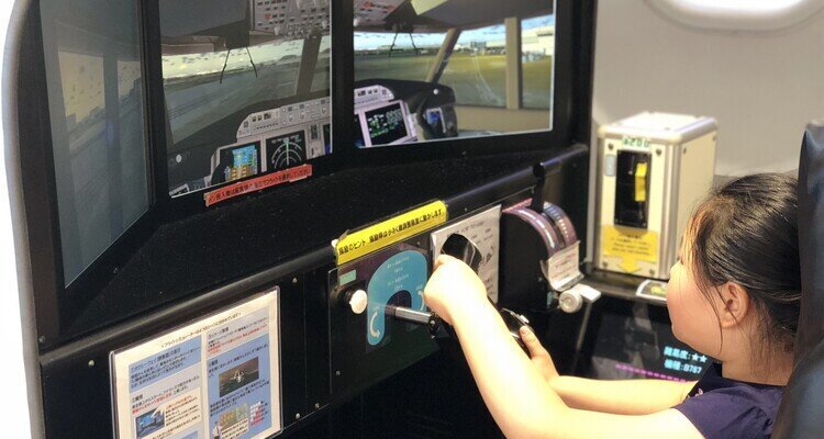 A flight simulation game at Haneda Airport, photo taken by our travel advisors