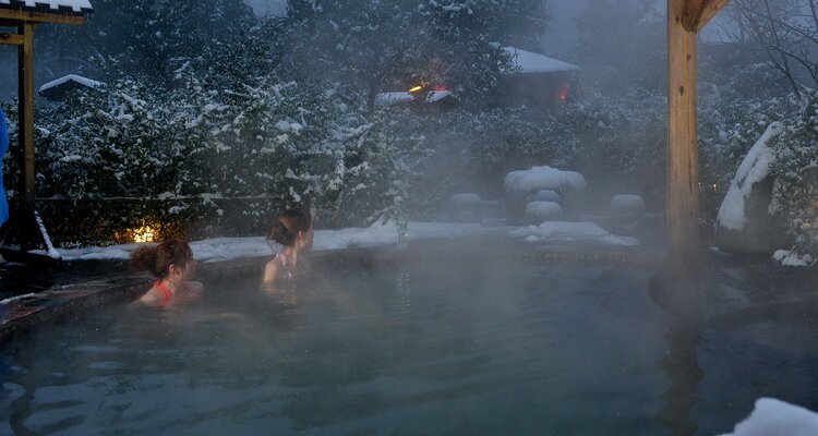 onsen with snow scenery