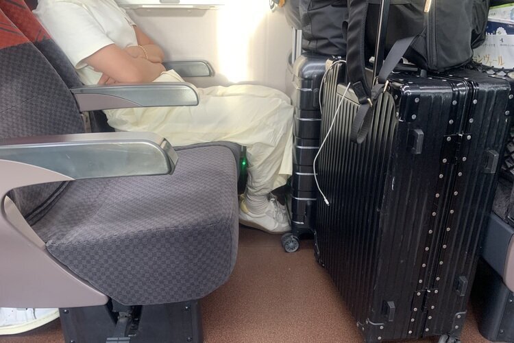 There is still enough legroom in front of the seat after placing luggage