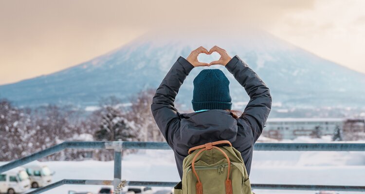 Tourist Visiting Niseko and sightseeing Yotei Mountain with Snow in winter season in Hokkaido, Japan