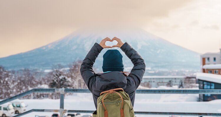 Tourist Visiting Niseko and sightseeing Yotei Mountain with Snow in winter season in Hokkaido, Japan