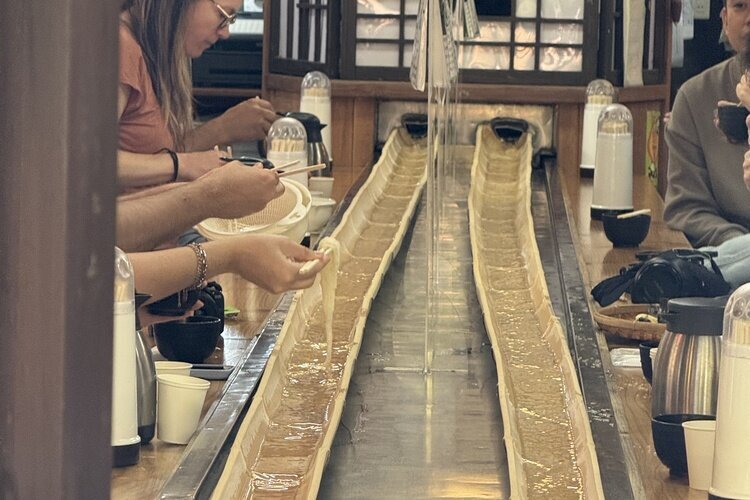 Flowing noodles at Takachiho Gorge