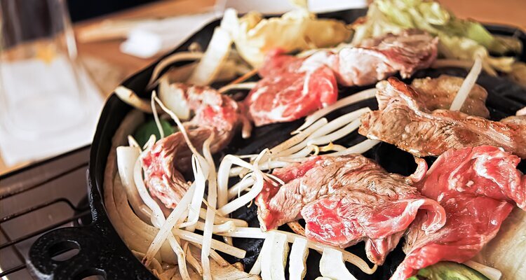 Asian-Style Pan-Fried Lamb Chops with Vegetables. Genghis Khan hot pot. Hokkaido cuisine. Sapporo cuisine
