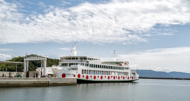 The Larger ferry docked at port in Naoshima, a Seto sea island in Japan with it s Yayoi Kusama livery